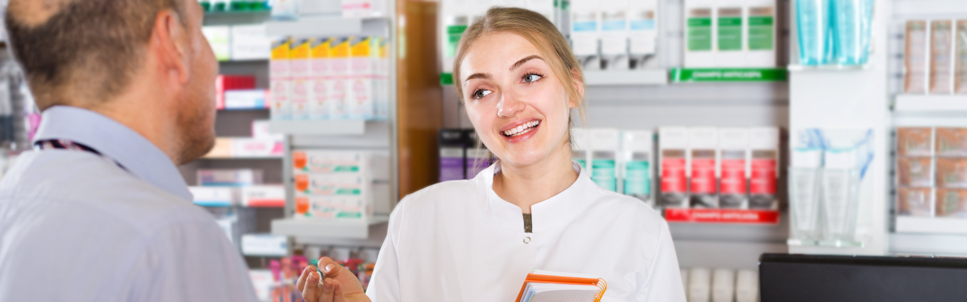 pharmacist talking to the customer